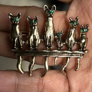 Gold Cat Brooch with Green Crystal Eyes